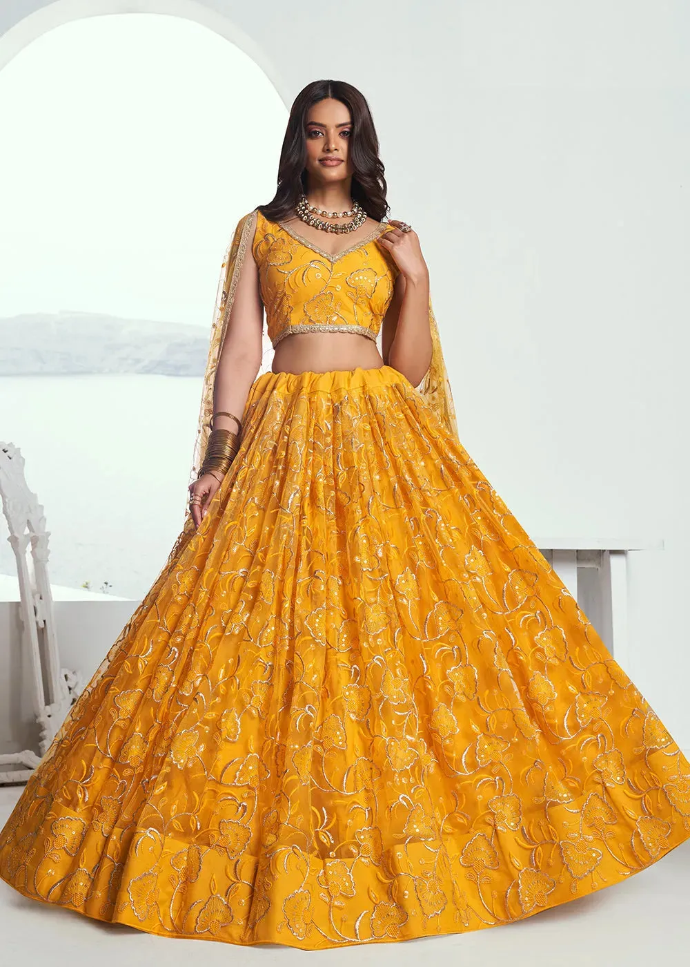 Exquisite Embroidered Net Yellow Wedding Wear Lehenga Choli