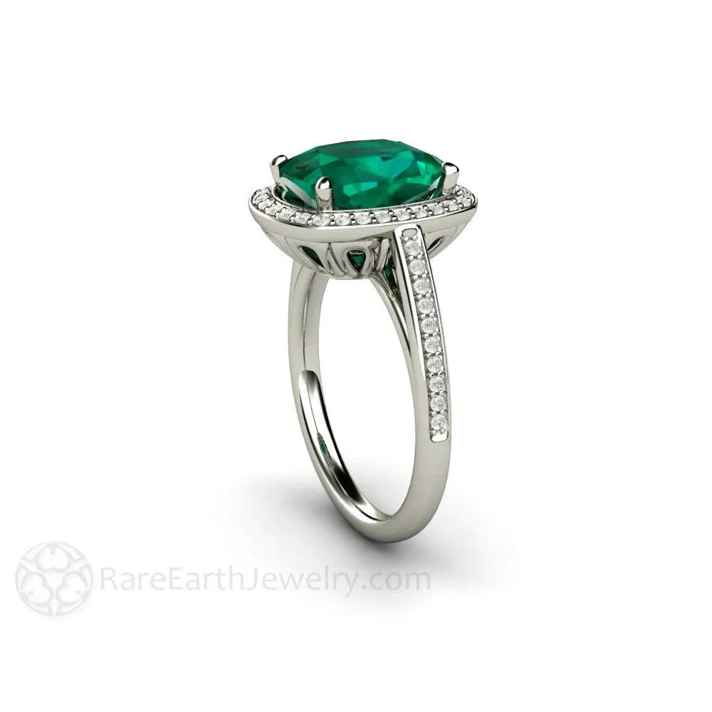 Large Emerald Cushion Cut Engagement Ring with Diamond Halo